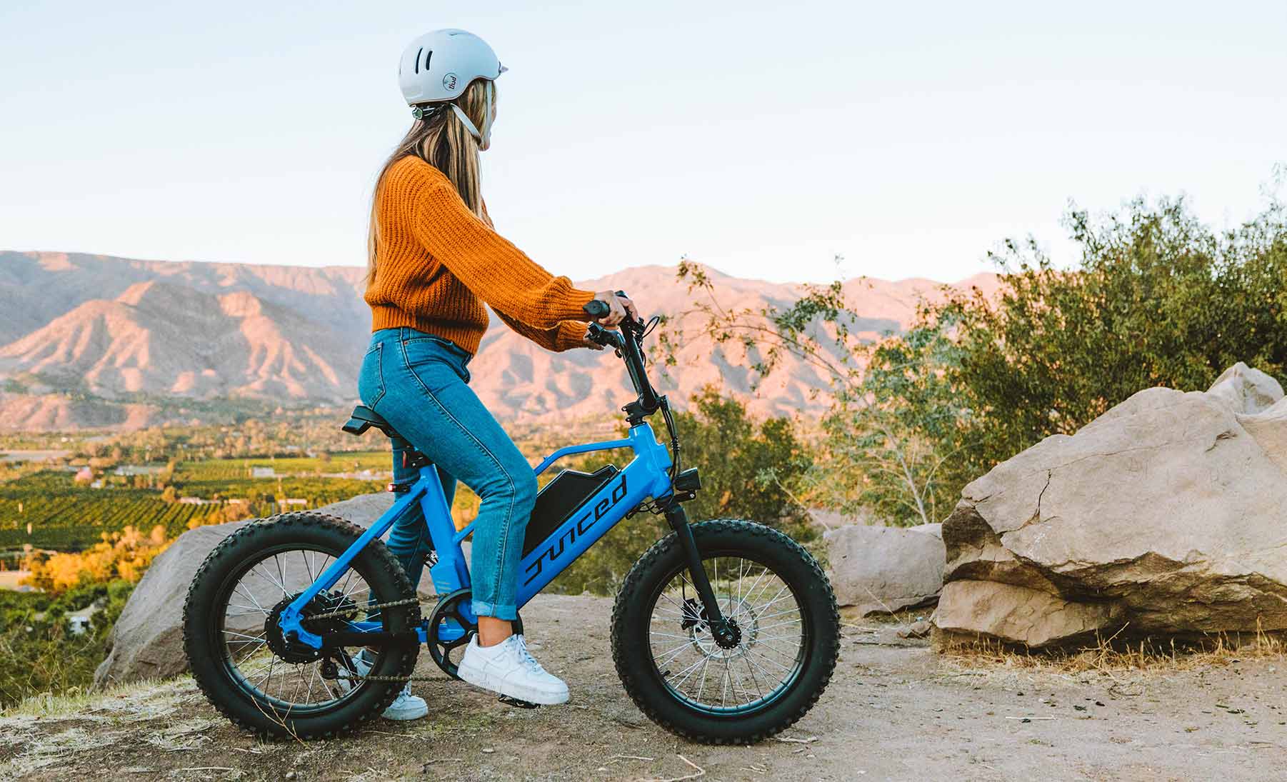 woman riding a juiced ripraced electric bike
